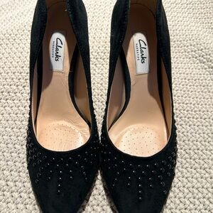 Clark’s Narrative line black suede 3 1/2 inch heels with black dot detail.